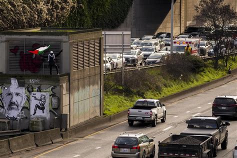 Protesters calling for cease-fire in Israel-Hamas war block freeway in Seattle for several hours