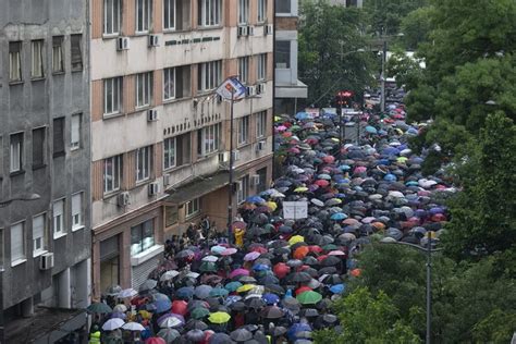 Protesters encircle Serbian state TV building to press government to ease its grip on media