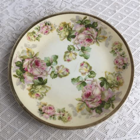 This is a Beyer and Bock of Volkstedt, Germany hand painted fern motif porcelain plate made 1905 to 1930 under the Royal Rudolstadt trade name valued at $45.. 