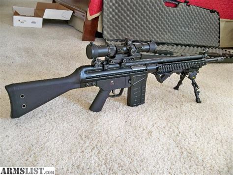 Specifications and Features: PTR Industries PTR 91 GI R 101 Semi Automatic Rifle .308 Winchester accepts 7.62x51mm NATO 18" Match Grade H&K Profile Tapered Barrel Threaded Muzzle 5/8x24 Removable Flash Hider 20 Rounds Delayed Blowback Roller-Locking Action H&K Slimline Polymer Handguard Classic H&K Metal Trigger Group Housing OD Green Polymer Fixed Stock Olive Drab Furniture Black Parkerized ... . 