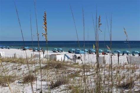 Public beaches in destin florida. Okaloosa Island is the beach destination in Destin-Fort Walton Beach Florida that offers 3 miles of sugar white super soft sand and the clear emerald green waters of the emerald coast beaches. Lying along the Florida Panhandle on the 24 mile stretch of the Santa Rosa Barrier Island between Navarre Beach, Florida and Destin Beach, Florida ... 