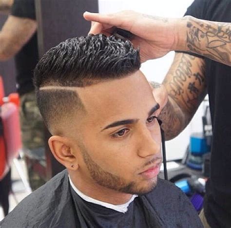 Puerto rican haircut fade. 17. Low Fade with Short Textured Hair. A low fade haircut short hair is a great option for injecting a stylish touch into many short haircuts for men. The fade, which gradually reduces the length of the hair from around the temples to the ears, naturally draws the eyes up, adding shape and focus to your look. 