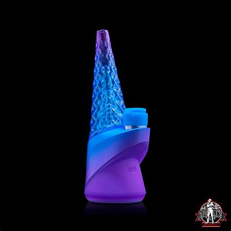 Description. Discover THE PEAK by PUFFCO, featuring a concentrate vaporizer with temperature control, 4 user heat settings, and intelligent temperature calibration. Constructed from thermal shock resistant borosilicate glass with a durable silicone base, THE PEAK offers a high-end, modern design on traditional analog dab rigs in which falls in ... . 