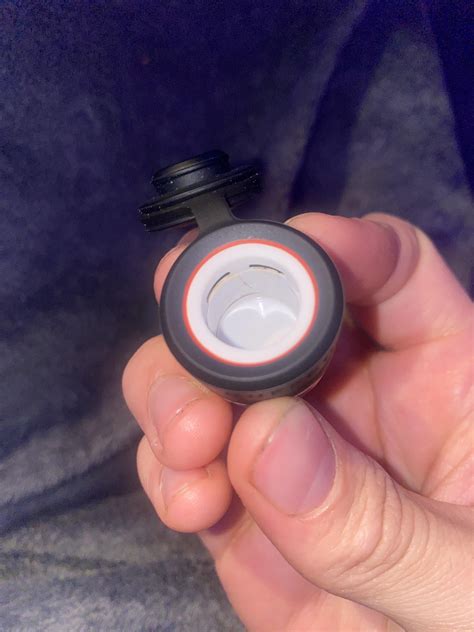 There’s some videos on YouTube on how to take the atomizer apart. On bottom there a rubber grommet with a brass insert in the middle. If you take that out make sure one wire is hanging over the edge and one is in the middle. If either wire is wrong it won’t connect right.. 