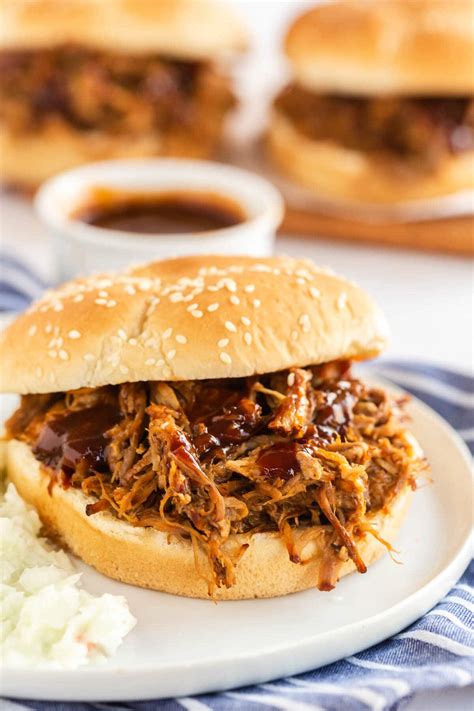 Place the pork in a slow cooker and add any remaining spices. Pour the BBQ sauce and broth into the slow cooker, cover with the lid, and turn the slow cooker on high for 5-6 hours or low for 8-10 hours. 1 ½ cups bbq sauce, 1 cup broth. Remove the pork from the pot and put it into a large bowl.. 