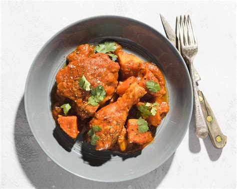 Punchy aromatics brighten the saucy chicken braise of Nigerian red stew