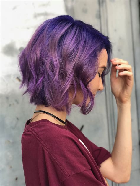 #10: Curly Pastel Purple. Curly pastel purple hair is a gorgeous combo. Naturally textured hair and colorful hair are becoming more trendy than ever. ... This dark pastel purple color on short hair is vibrant, especially in person. If you initially want pastel lavender hair, remember that pastel tones usually last a few washes before balancing .... 