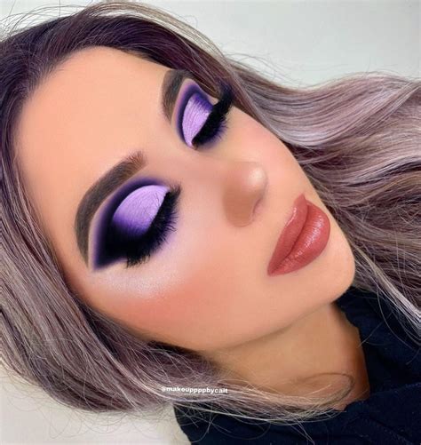 Purple eye shadow. A true purple powder eye shadow with a satin finish. HOW IT LOOKS/FEELS: The silky purple shadow with a touch of shimmer may look intense in the compact, but it goes on light and iridescent. 