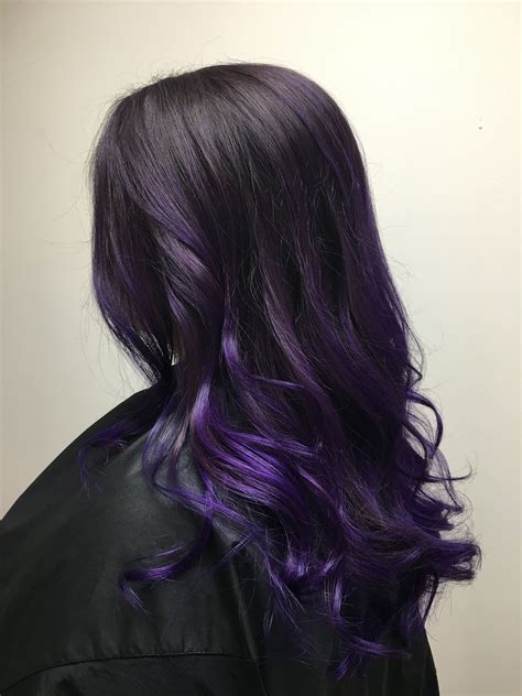 Purple hair on dark hair. 27. Dark Purple Ombre Bob. Ombre is a gorgeous color trend and next we have a pretty purple version to show you. For this look, the hair starts black then blends to dark purple and finally to a light purple shade. This is a beautiful way to wear darker purple and a more pastel tone together. 