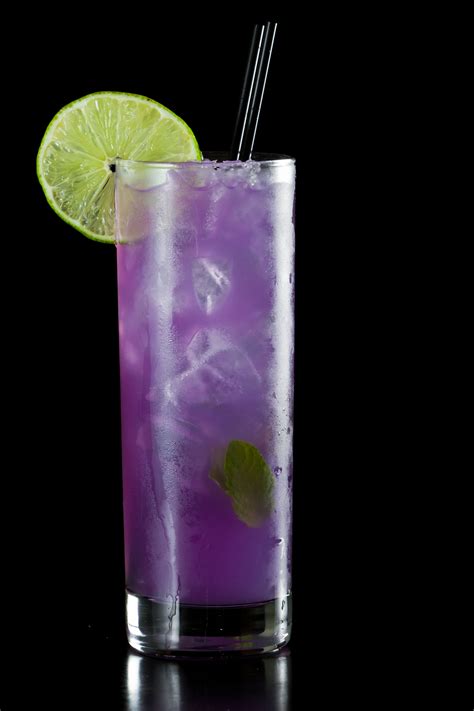 Purple rain drink recipe. Purple Rain cocktail origin. According to my research, it's called the Purple Rain because when you add the grenadine last, it mixes with the blue curacao, but also sinks to the bottom of your drink. It literally rains purple. How to make this cocktail. In a cocktail shaker, add your vodka, lemonade, grenadine and blue curacao. 