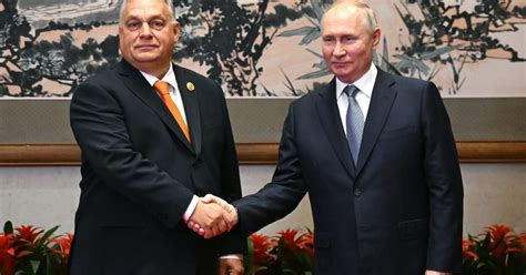Putin in first pictured handshake with EU leader since start of Ukraine invasion