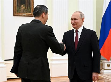 Putin meets with China’s defense minister in Moscow