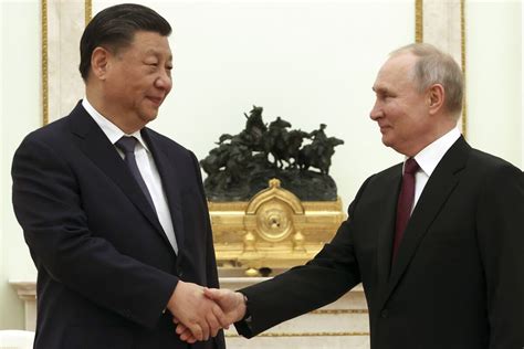 Putin sticks to protocol during Chinese leader Xi’s visit