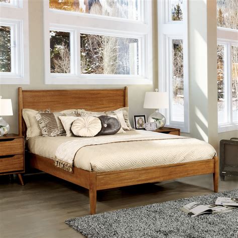 Queen wood bed. Give your bedroom or guest room a rustic refresh with this clean-lined bed. Made of 100% solid pine wood, this bed features a sturdy frame construction that can last for years. The finish is designed to accentuate the unique grain, knots, and natural textures in the wood panels; and each piece is sanded and distressed by the hand, leading to variations in the color and texture that make every ... 
