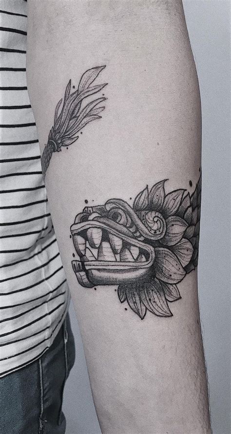 Quetzalcoatl tattoo arm. 70% of young, working professionals with tattoos say they hide their tattoos from the boss. By clicking 