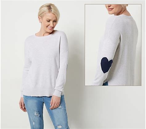 Qvc heart sweater. It may not be new. In some instances, these items are repackaged by QVC. Fabrication: sweater knit. Features: long balloon sleeves; mock turtleneck; dropped shoulder; straight hem; ribbed collar, band, cuffs. Fit: semi-fitted; follows the lines of the body with added wearing ease. Length: missy length 26" to 28-1/8"; plus length 28-1/2" to 30-1/4". 