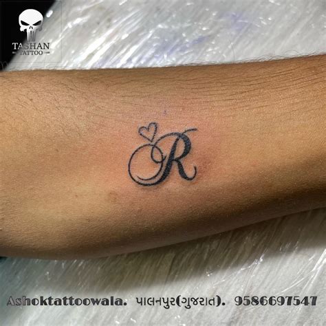 R letter Tattoo Alphabet tattoo designs, Letter r tattoo, Hand tattoos