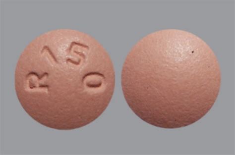 R150 Pill - pink round, 9mm. Pill with imprin