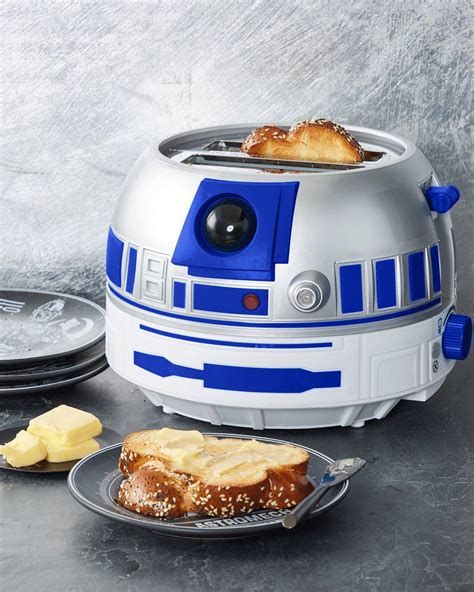 R2d2 toaster. Includes Toaster & Instruction Manual 900W total power R2-D2 chirps and blinks in a 10 second sound sequence when toasting Holographic projector illuminates the toaster body during toasting Two wide slots Adjustable temperature settings Bagel and Cancel buttons Removeable crumb tray Officially Licensed Measures 10.43"x … 