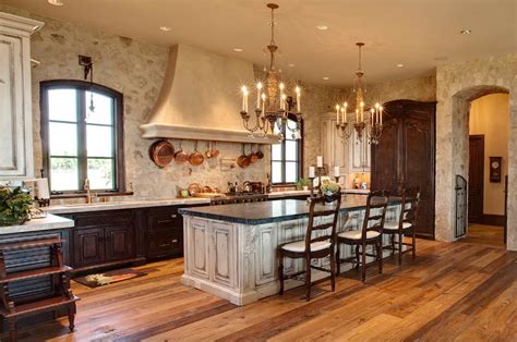 Rustic Mediterranean Kitchen with Stone Walls and Wood Cabinetry - balustradellc
