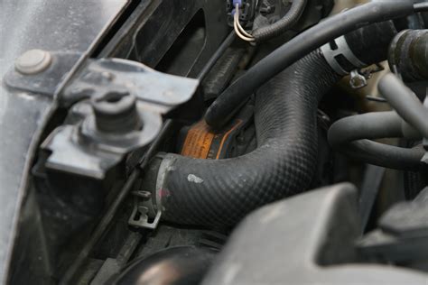 Cold Weather. Cold weather causes fluid to expand. If the coolant in your radiator expands, it can cause the coolant tank and hoses to crack or even burst. Adding antifreeze to your coolant lowers the freezing temperature of the fluid. A lower freezing temperature means liquid expansion is less likely to occur.