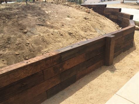 Railroad tie retaining wall. Things To Know About Railroad tie retaining wall. 