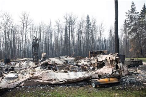 Rain forecast could slow down record-breaking Alberta wildfires, officials say
