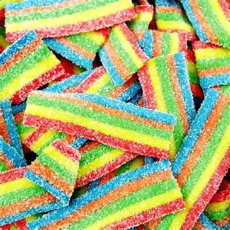 Rainbow sour belts. Zweet Sour Rainbow Rope trays are packed with fruity flavor and a sweet and sour punch. These chewy belts are a fun treat for everyone! Available in a variety of flavors and styles that will satisfy every craving. Reusable containers are perfect for sharing and offer a truly eye-catching presentation. Plus our handy ca 