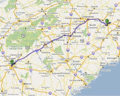 The total straight line flight distance from Raleigh, NC to Atlanta, 