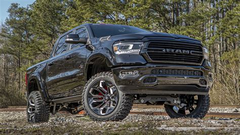 Ram 1500 black widow. A 5" Suspension Lift Kit featuring high strength cross members, steering knuckles, and upper control arms, is tough enough to tackle any terrain with a stance that towers above the competition. 37" Premium All-Terrain Tires complete the Black Widow wheel and tire package. Custom designed Black Widow 20" wheels are standard equipment on the RAM ... 