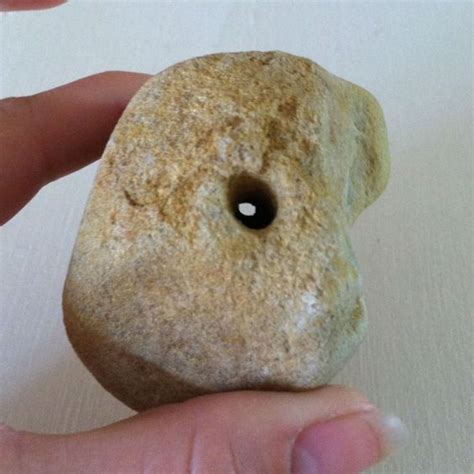 Rare indian artifact rock with hole. 3" Mortar Pestle Native American Indian stone grinding artifact arrowhead Point. $37.50. 0 bids. $9.60 shipping. Ended. Native American Paleo Indian Artifact.. Large Flat Mortar And Grinding Stone. $20.00. 0 bids. 