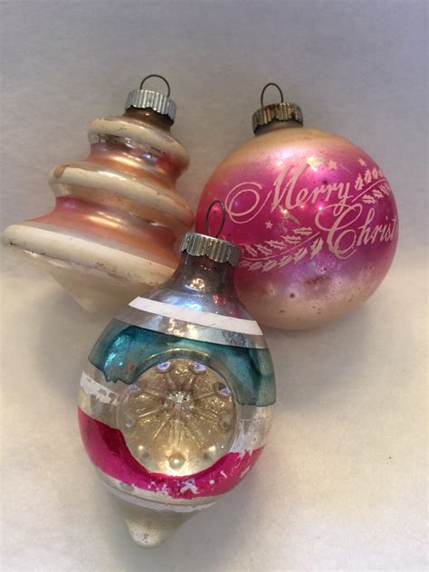 Rare vintage christmas ornaments. 1. The Feel of a Vintage Ornament. “I can tell a vintage ornament by its patina and how it feels,” says Stark. “Modern ornaments are also often made of a composition material or even hard plastic which tries to mimic the older mercury glass,” says Martin. “You can tell by tapping on it if it is glass or not.”. 