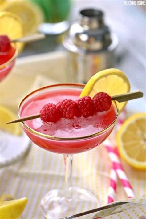Raspberry lemon drop. Instructions. Using a vegetable peeler, peel a strip of lemon zest from around the middle of one of the lemons. Slice two long, thin strips from the peel. Twirl each strip into a twist and set aside. Measure the vodka, lemon juice, raspberry liqueur, and syrup into a cocktail shaker. Add ice and shake vigorously. 