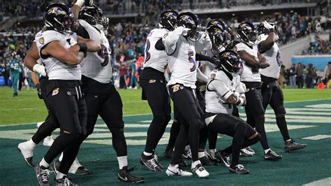 Ravens beat mistake-prone Jaguars 23-7 for 4th consecutive victory and clinch AFC playoff spot