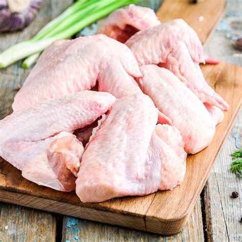 Raw chicken wings. There are 81 calories in 1 small Chicken Wing. Get full nutrition facts and other common serving sizes of Chicken Wing including 1 oz, with bone of and 1 oz, with bone of cooked. 