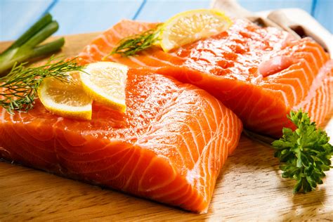 Raw salmon. 1. Raw salmon is an excellent source of protein and omega-3 fatty acids. 2. Feeding your cat raw salmon can help reduce hairballs. 3. Raw salmon is rich in nutrients that can boost the immune system. 4. Salmon is a natural source of taurine, which is … 