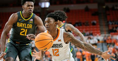 RayJ Dennis scored 18 points as No. 18 Baylor beats Oklahoma State 75-70 in OT