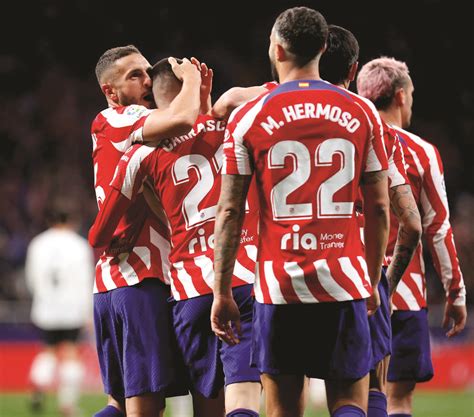 Rayo botches trick penalty in draw; Atletico sinks Valencia