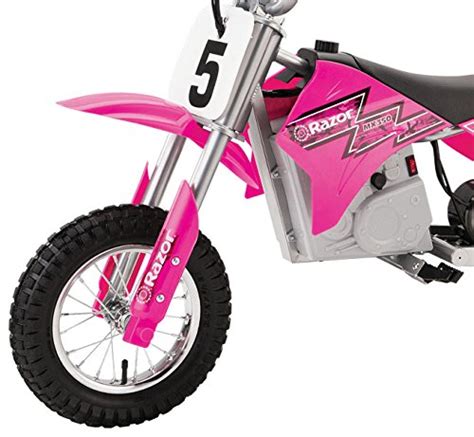 Description. A real miniature electric motocross bike for real electrifying thrills! For ages 12 and up, the Dirt Rocket MX350 is rated at up to 140 lbs., reaches speeds of up to 14 mph and and travels up to 10 miles in a single charge! The variable speed chain-driven motor delivers super-quiet yet powerful performance.