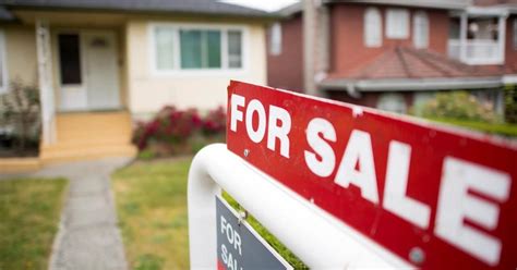 Real estate market notches downward amid climbing interest rates, association says