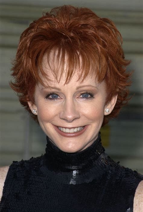 As Reba explained, she had to hide her short hair for a while, “I had to wear a baseball cap with a ponytail sewn in the back and then wear wigs and tail. That was from June on the photoshoot all the way up until the CMA’s. That’s when I came out with my hair cut off. But I’d had it cut off for six months.”. 