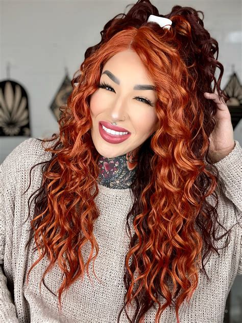 Silky soft, multi fiber hair blend, feeling like your own soft and healthy hair. Natural melted hairline with invisible lace. Deep, natural, extended and curved 3 inch left parting. Full lace flex cap. Cap contains 3 combs. Custom color blending. Brown wig with blonde highlights throughout. Medium wig. Curly wig.. 