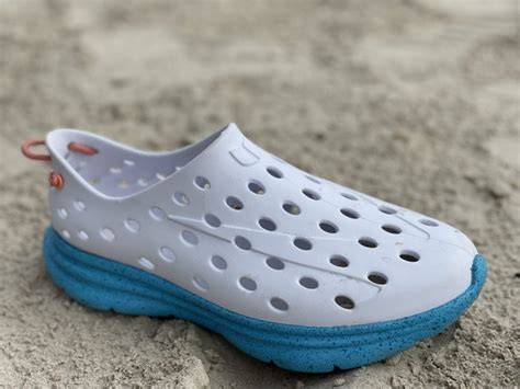 Recovery shoe. College: Ohio State. Add to bag. A transformative, sustainably designed injection molded sneaker for active recovery. Washable. Quick drying. Ultra durable. Free Shipping on orders over $100. Includes 3 swappable hang loops (not to be pulled on) Made in Brazil from sugarcane-based EVA foam. 