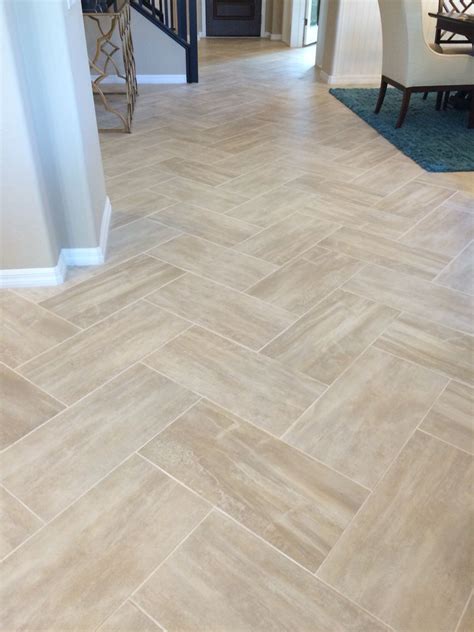 Rectangle tile in zig zag pattern in model home. Not sure of