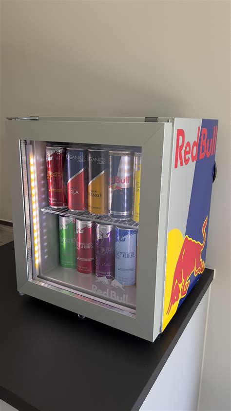 Red bull energy drink mini fridge. Red Bull Energy Drink Mini Refrigerator Fridge is a nice Red Bull fridge that is in excellent condition, this fridge is used and is cosmetically in perfect shape. This fridge is the latest version in Red Bull Fridges and is fully illuminated when powered on. The fridge comes with the Red Bull logos on the sides and back lit front facing. 