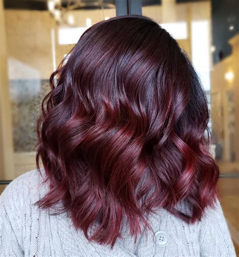 Red burgundy hair. 