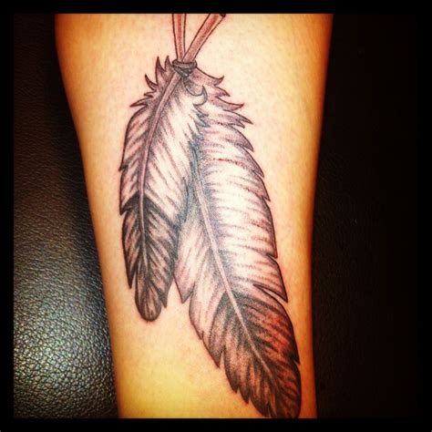 Red indian feather tattoo. Things To Know About Red indian feather tattoo. 