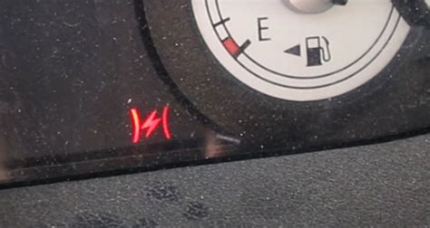 Red lightning bolt on dashboard. 