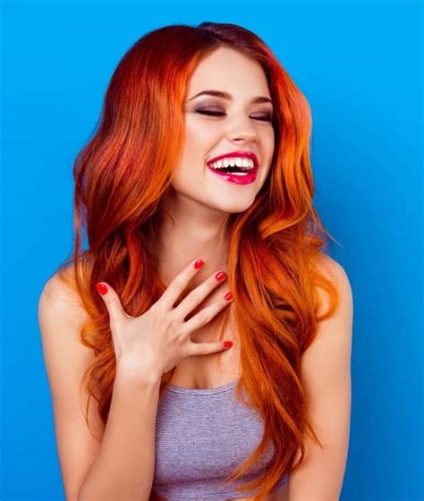 Red orange hair. To dye your hair from orange to red, you will need to first lighten your hair to a paler shade of orange using a bleach or hair lightener. This will help remove some of the existing color and allow the red dye to show up more vibrant. Once your hair is light enough, you can apply the red hair dye of your choice. 