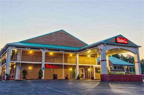 Photo gallery for Red Roof Inn Crossville. Exterior. Seasonal outdoor pool. Superior Room, 1 King Bed, Non Smoking | Desk, blackout drapes, iron/ironing board, free ....